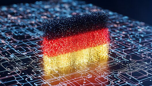 vbob aktuell Modernisierungsagenda - Klares Bekenntnis der Bundesregierung fehlt / Digitale deutsche Flagge mit leuchtenden Partikeln vor einem Hintergrund aus Leiterplatten